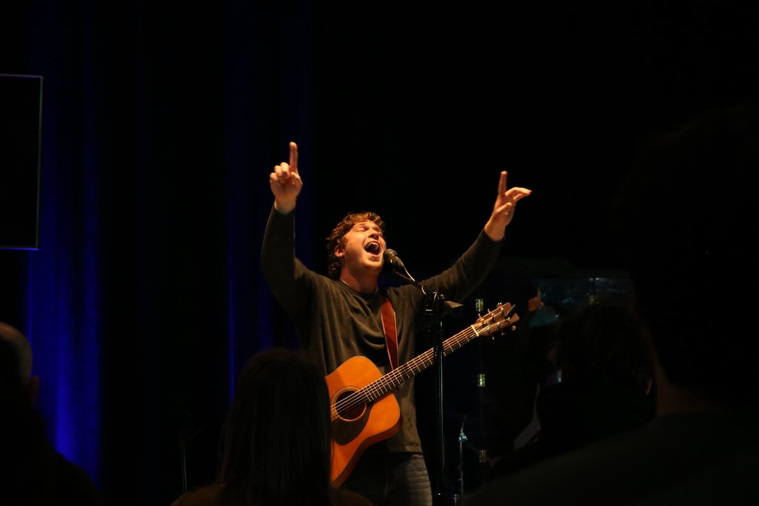 Ben Johnson the worship leader at vertical has a passionate moment on stage